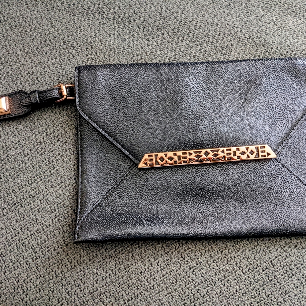 Stella & Dot wristlet with rose gold details